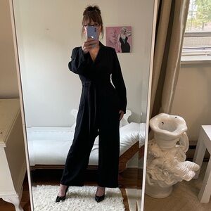 BLACK LONG SLEEVE JUMPSUIT ZIPPER BUTTON WIDE LEG POCKETS STRETCH WAIST TIE BELT